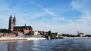 Cathedral of Magdeburg and the river Elbe. Courtesy: Torsten Maue - Flickr: Blick zum Dom. Licensed under CC BY-SA 2.0 via Wikimedia Commons