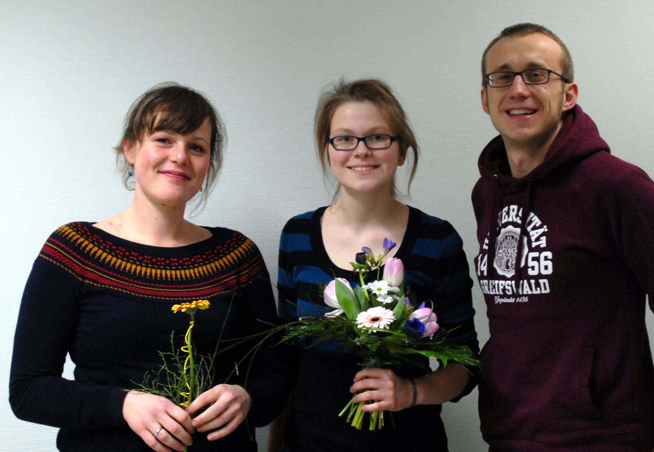 Picture of Anne, Desi and Falk (from left to right) after Desis final exam