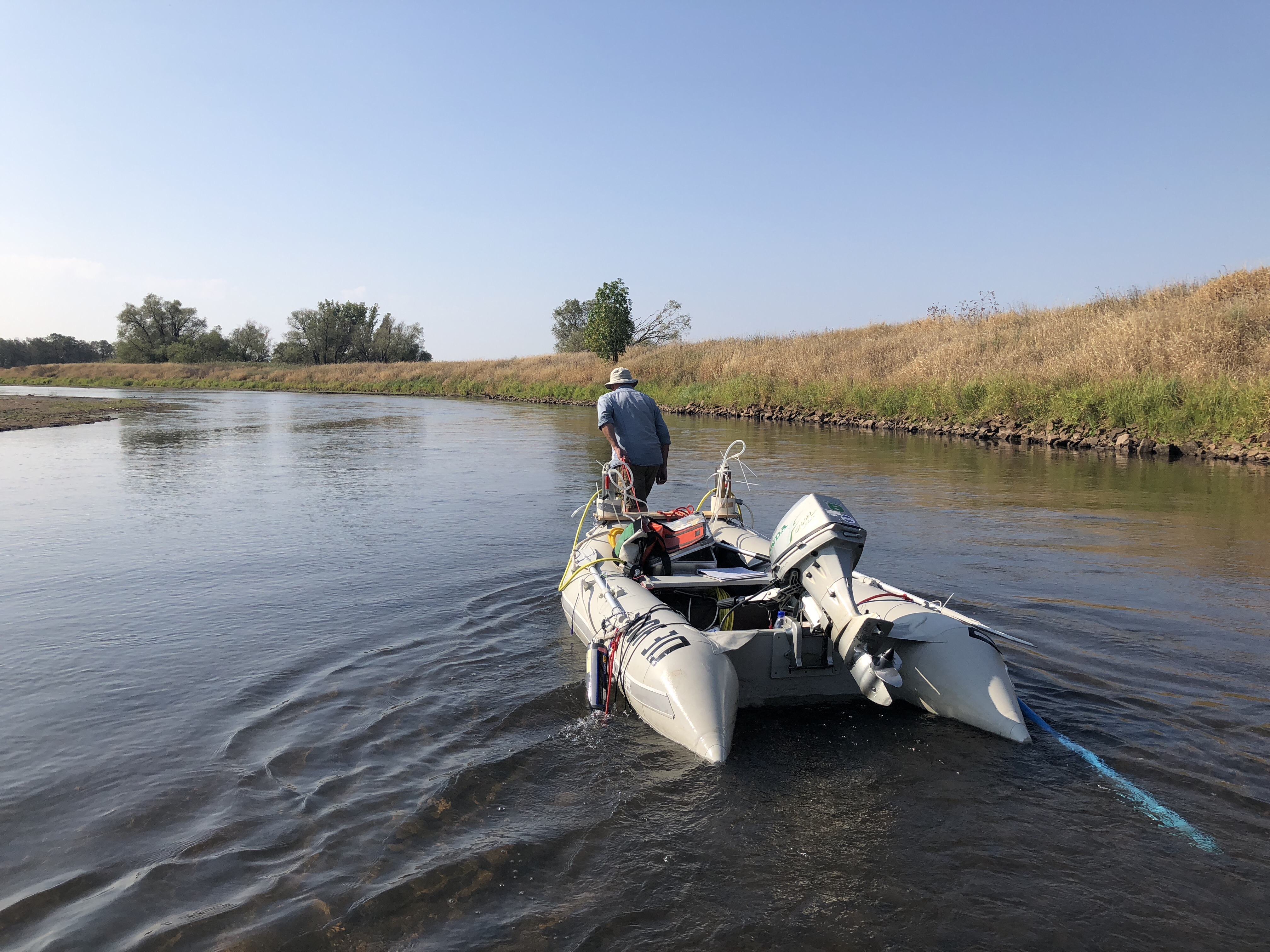 Grounded sampling zodiac due to low flow during campaign in Aug. 2018