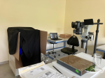 Zymography set up. The box with the black curtain provides a dark chamber for implementing zymography. The camera and rhizobox are inserted in the dark chamber for photography under UV-light