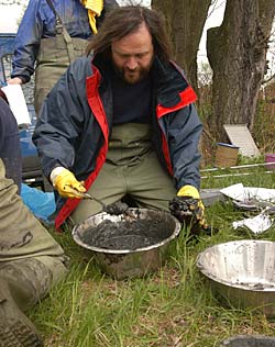 Scientist take samples from the River Elbe