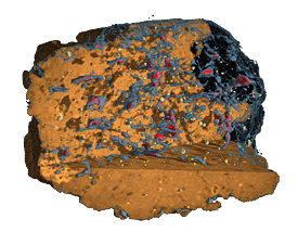 3D CT-Aufnahme der Porenstruktur eines Bodenaggregates (Durchmesser 15 mm) mit der Verteilung von Wasser (blau), Luft (rot) und Quarzkörnern (gelb). 3D CT-Aufnahme der Porenstruktur eines Bodenaggregates