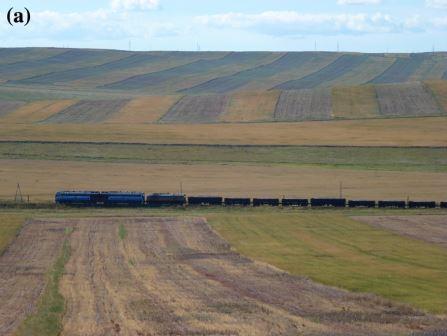 Typical strip-pattern of cultivated and fallowed fields; note the erosion marks on the fallows